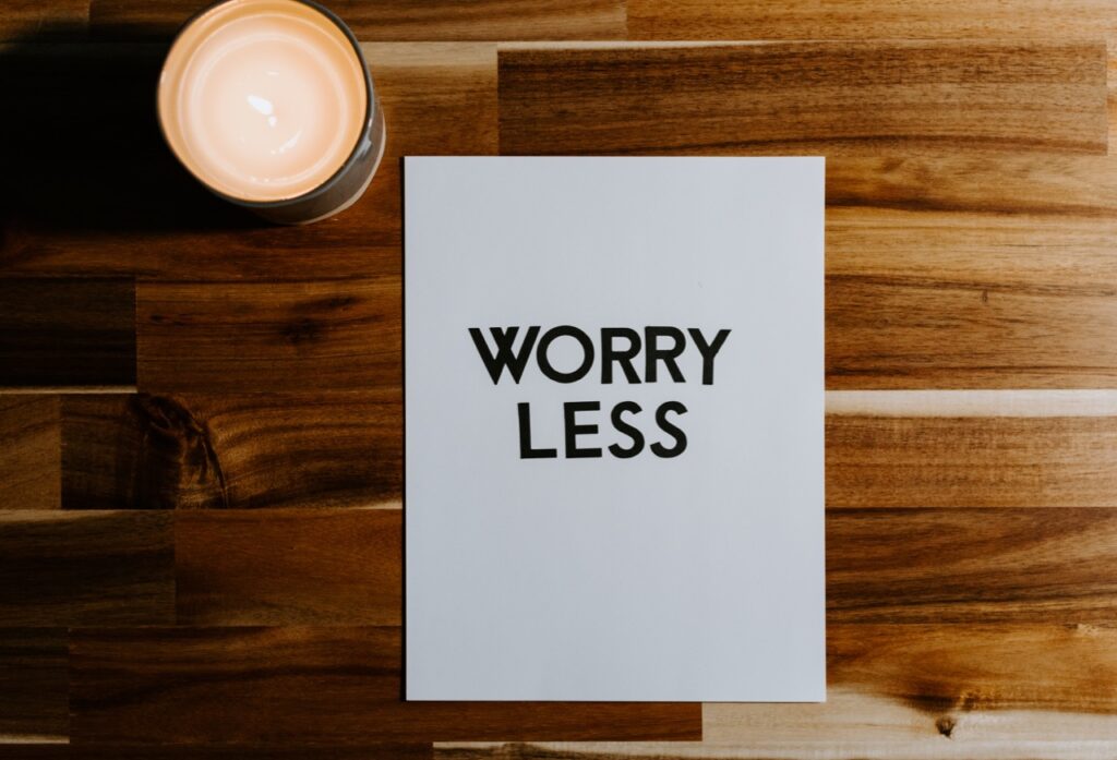Sign that reads "Worry Less"