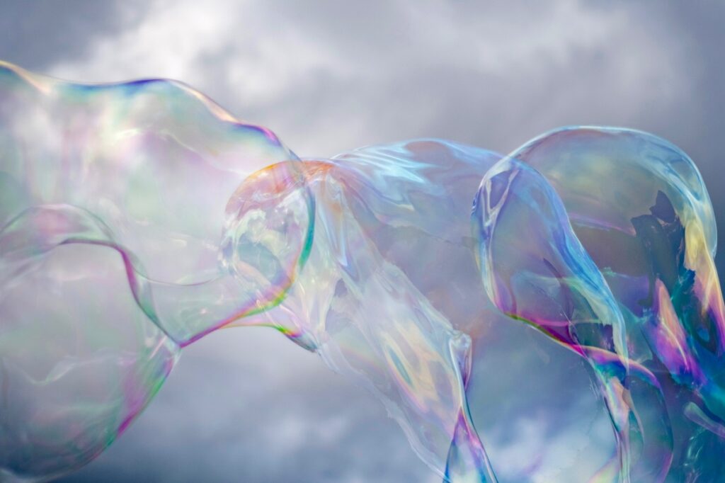 soap bubbles reflecting the colors of the rainbow